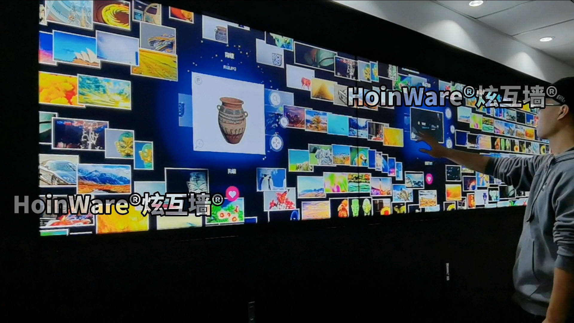 华为手机窗口缩放动画
:HoinWare炫互墙-多媒体展厅的动态流水互动图片墙软件、照片互动LED触控墙软件